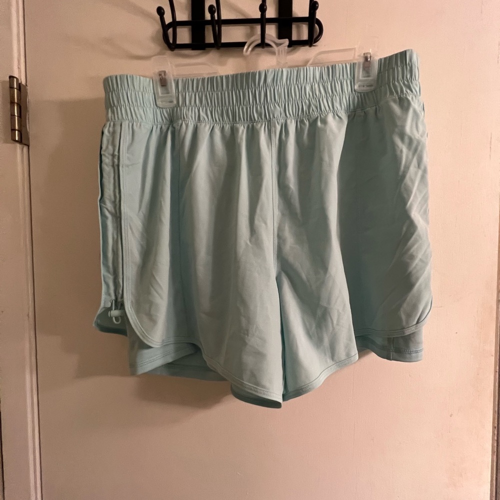 Bring a new workout shorts with spandex underneath